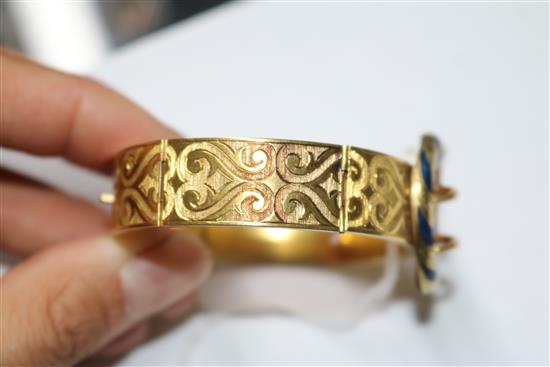 A Victorian engraved gold and blue enamel buckle bracelet (a.f),